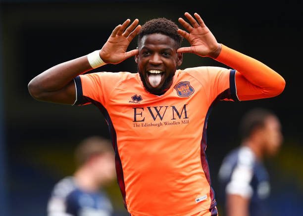 SOUTHEND, ENGLAND - APRIL 03: Offrande Zanzala of Carlisle United celebrating his teams first goal during the Sky Bet League 2 match between Southend United and Carlisle United at Roots Hall on April 03, 2021 in Southend, England. Sporting stadiums around the UK remain under strict restrictions due to the Coronavirus Pandemic as Government social distancing laws prohibit fans inside venues resulting in games being played behind closed doors. (Photo by Jacques Feeney/Getty Images)
